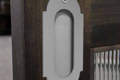 Flush pull handle with winged face plate
