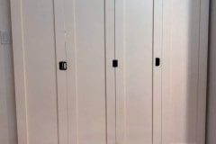 a custom Barnfold installation where all four door panels open to one side