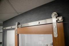 Stainless Steel Series hardware on office barn door